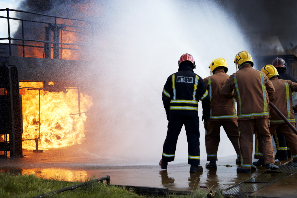 extinguishing fire during workplace fire safety training.